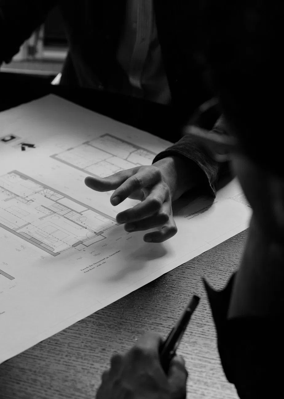 Team discussing architectural plans